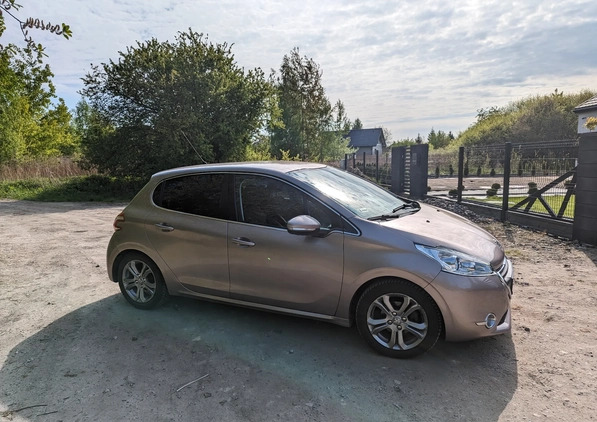 Peugeot 208 cena 22000 przebieg: 220000, rok produkcji 2014 z Dęblin małe 79